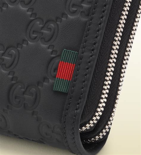 gucci zip wallet men's.